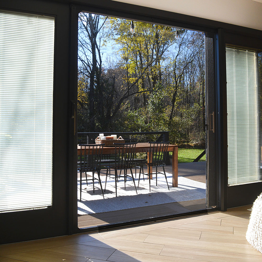 Retractable screen disappears to reveal scenic view